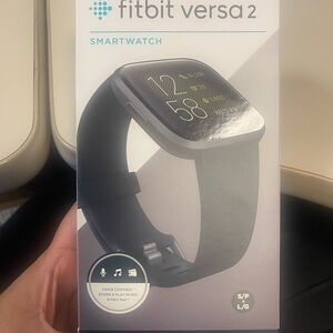 New in Box.. never used Fitbit Versa 2